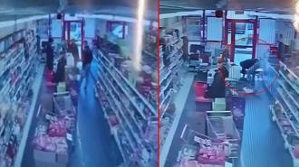 Jandarma personelinin, marketteki müşteriyi kalp masajıyla hayata bağladığı anlar kamerada
