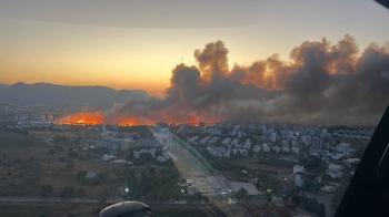 Mersin'de yerleşim yeri yakınında çıkan yangın, büyümeden kontrol altına alındı