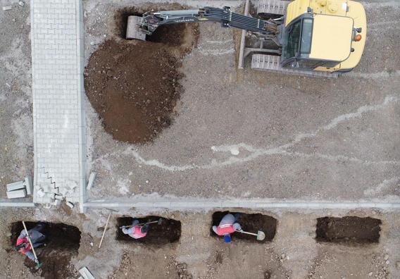 Winter preparation in the cemetery; graves are dug before the ground freezes