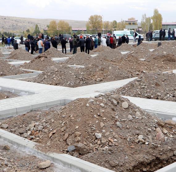 Winter preparation in the cemetery; graves are dug before the ground freezes