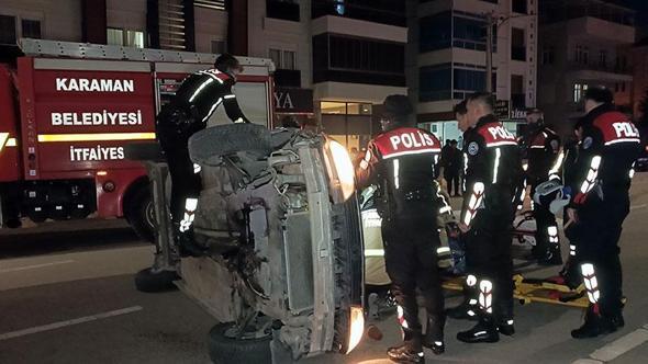 Park halindeki otomobile çarpıp takla atan araçta mahsur kaldı