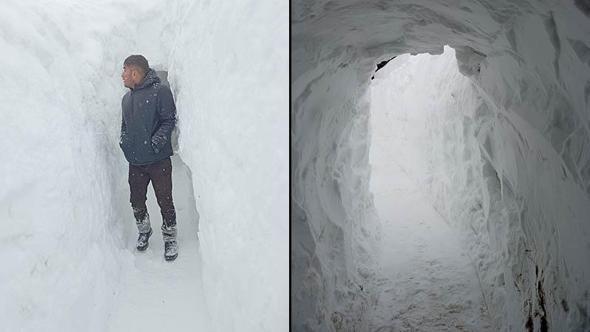Kar kalınlığının 2 metreyi bulduğu mezrada evi ile ahırı arasına tünel açtı