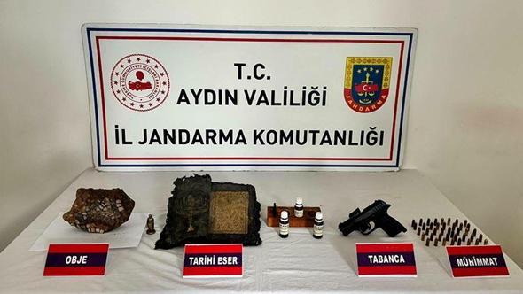 Aydın'da tarihi eser operasyonu; deri üzerine altın işlemeli tılsım kitabı ele geçirildi