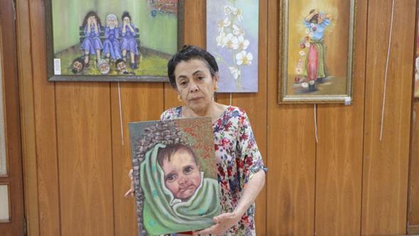 Adanalı ressam, asrın felaketinde 128 saat sonra enkazdan çıkarılan Vatin bebeği resmetti
