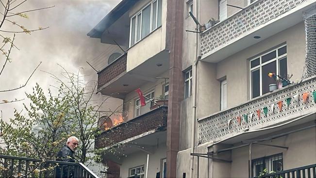 Yangında mahsur kalan görme engelliyi otopark görevlisi kurtardı