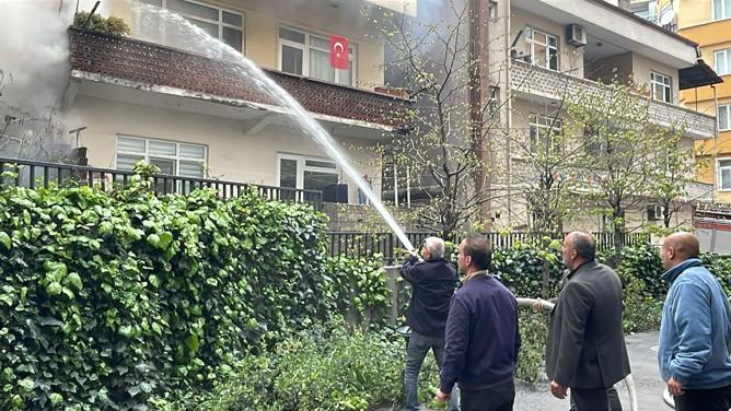 Yangında mahsur kalan görme engelliyi otopark görevlisi kurtardı