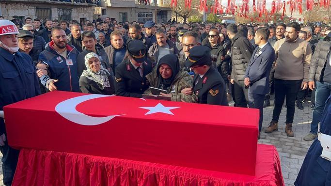 Şehit oğlunu son yolculuğuna Allahım cennetine al diyerek uğurladı