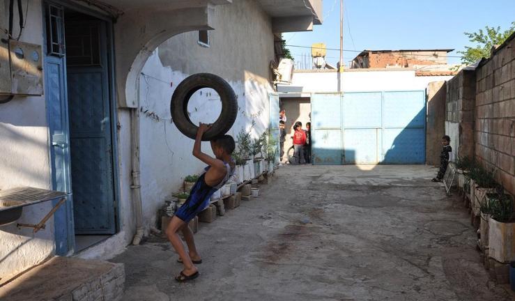 Otomobil lastiği ile antrenman yapan Mustafa, güreşte Türkiye üçüncüsü oldu