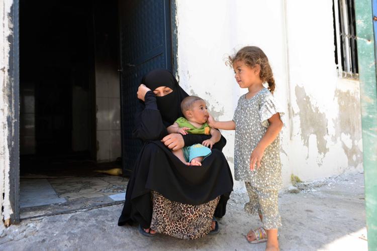 ‘ATEŞİN İÇİNE GİRİP, BEBEĞİMİ ÇIKARDIM’