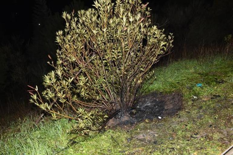 Yol kenarına bırakılıp ateşe verilen valizden yanmış ceset çıktı