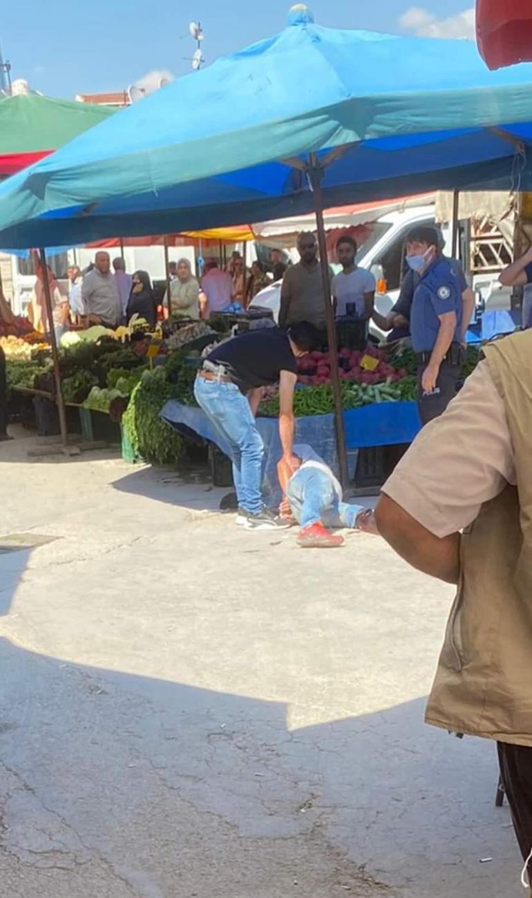 Halk pazarında bıçakla saldıran şüpheli, ayağından vurularak yakalandı