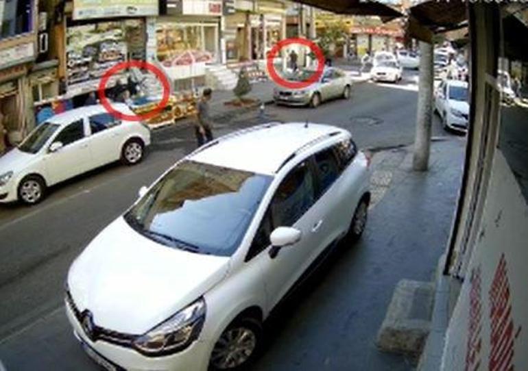 Cadde ortasındaki silahlı çatışma kamerada