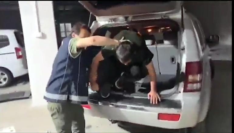 Yurt dışına kaçmaya çalışan terör şüphelisi, otomobil bagajındaki gizli bölmede yakalandı