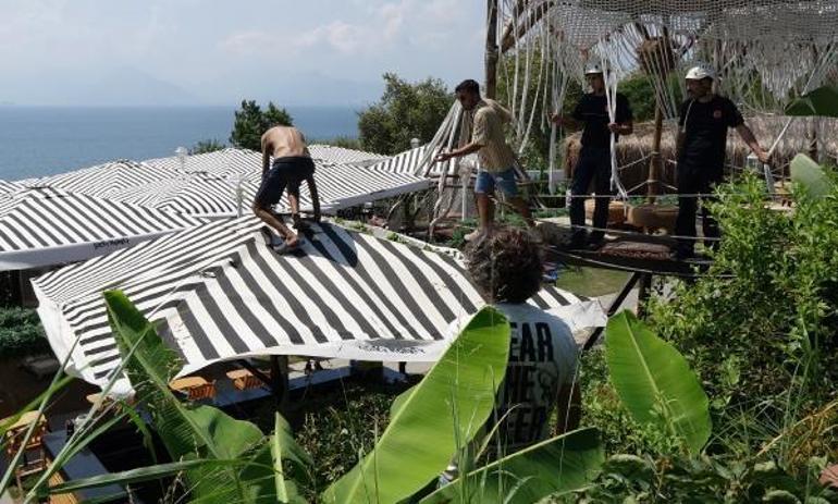Polise zor anlar yaşattı, üstüne çıktığı şemsiye tentesi yırtılınca yakalandı
