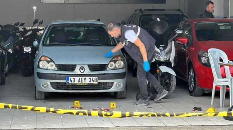 Kasklı saldırgan, galericiyi silahla ağır yaraladı