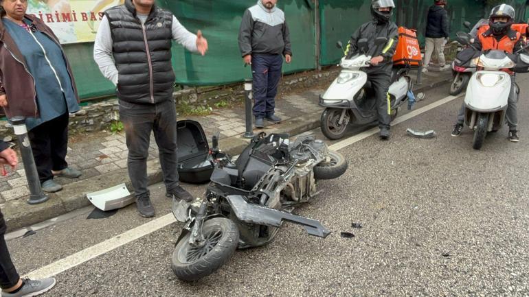 Maltepede hakimiyetini kaybeden motosiklet sürücüsü taksinin altında kaldı