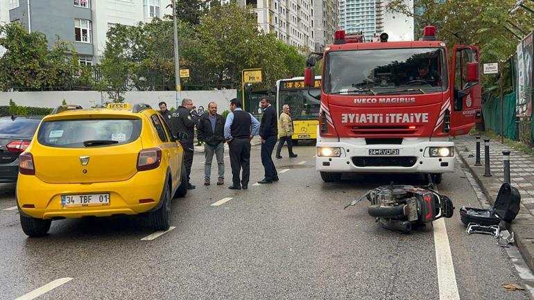 Maltepede hakimiyetini kaybeden motosiklet sürücüsü taksinin altında kaldı