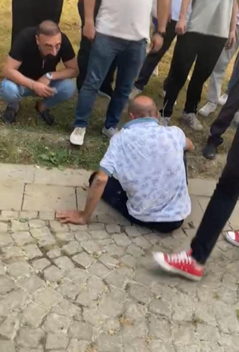 Fatihte parkta taciz iddiası; şüphelinin darbedildiği anlar kamerada