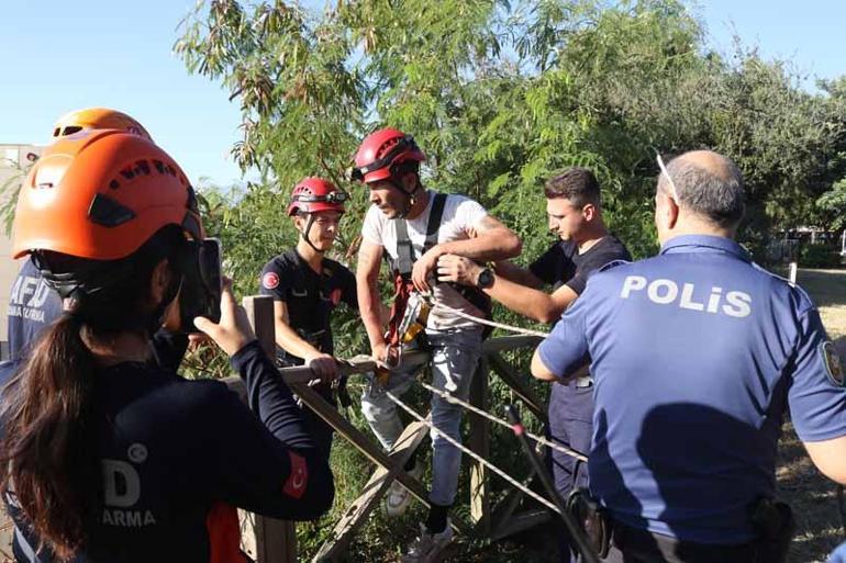 2 kişiyi kovalarken falezlerde kayalıklardan düşüp, mahsur kaldı