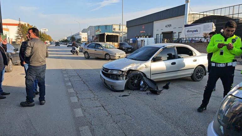 Bursada otomobille motosikletin çarpışması kamerada; 2 yaralı