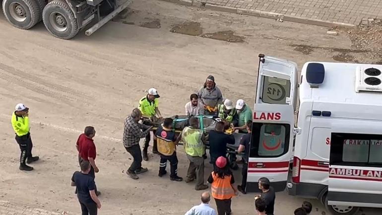 Toprak altında kalan işçinin arkadaşları tarafından kurtarılması kamerada