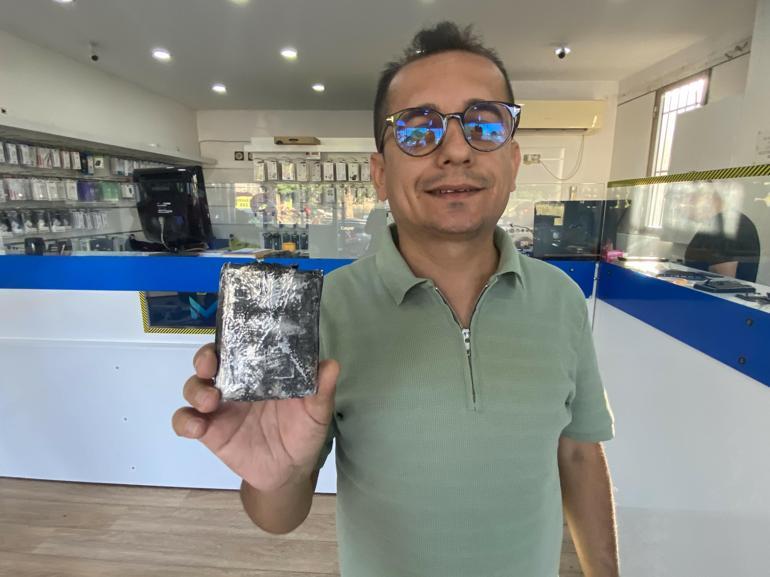 Telefon bataryası tamir sırasında patlayıp, alev aldı