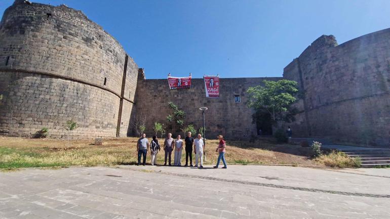 Diyarbakırda surlara asılan İmamoğlu pankartlarına polis el koydu