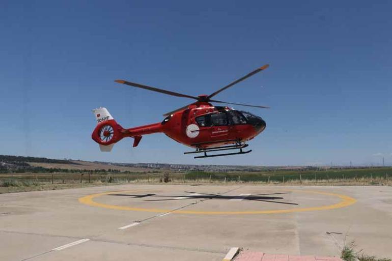 Çim biçme makinesine kolunu kaptırdı, ambulans helikopterle sevk edildi