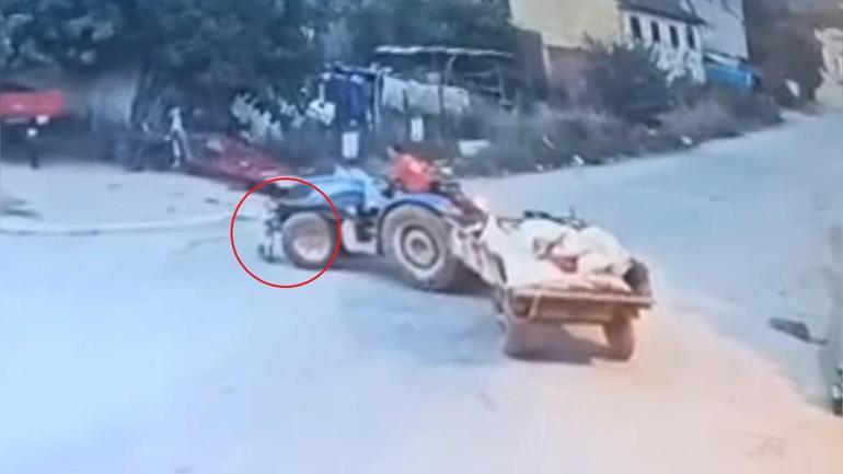 2 yaşındaki Batunun, babasının kullandığı traktörün altında kaldığı anlar kamerada
