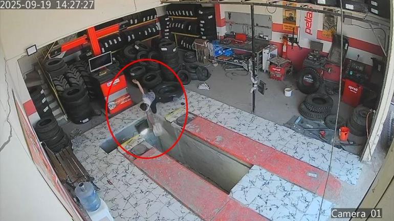 Oto lastikçide çalışan çırağın tamir çukuruna düştüğü anlar kamerada