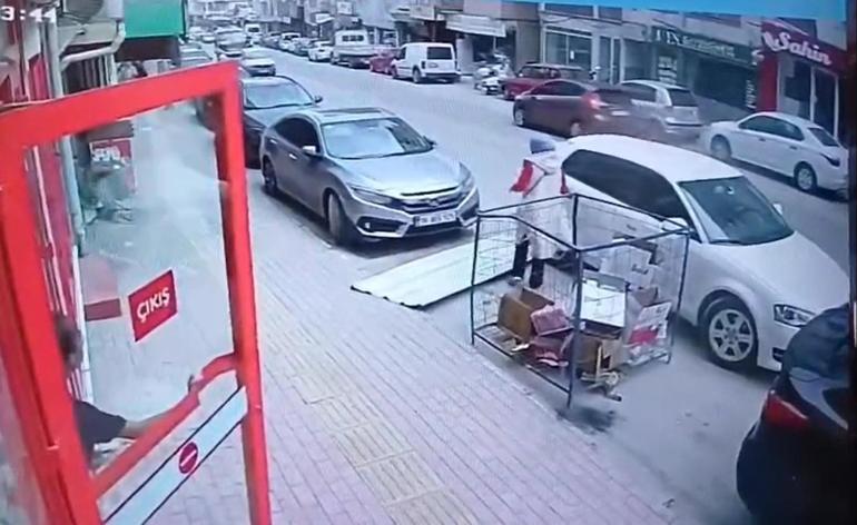 Çatıdan uçan sacın altında kalmaktan son anda kurtuldu