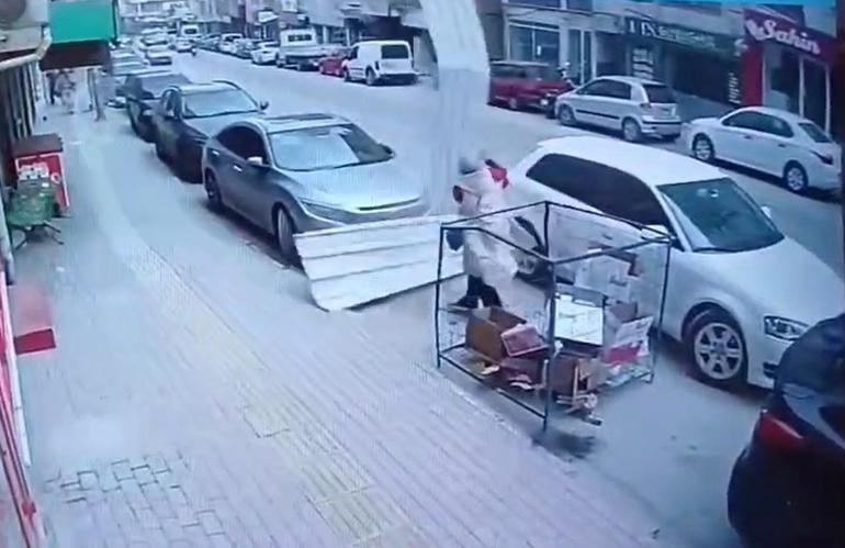 Çatıdan uçan sacın altında kalmaktan son anda kurtuldu