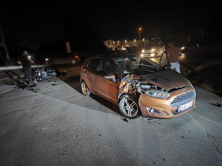 Otomobil ile çarpışan motosikletin sürücüsü yaralandı; kaza kamerada