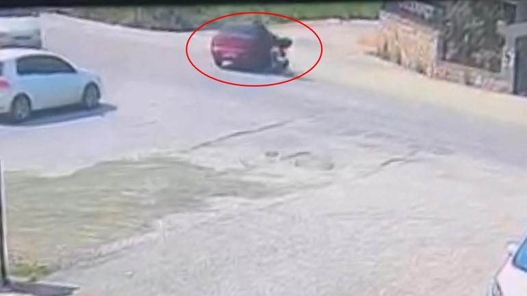 Otomobil ile çarpışan motosikletin sürücüsü yaralandı; kaza anı kamerada