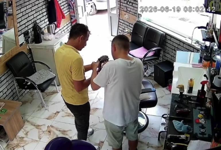 Ayağındaki misina nedeniyle tellere takılan güvercin kurtarılıp, berberde pansumanı yapıldı
