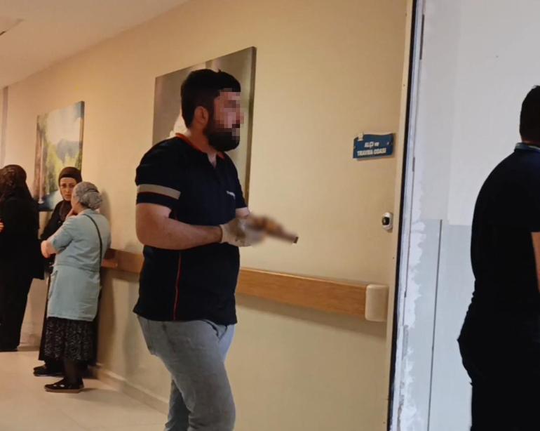 Eline saplanan çivili tahtayla hastaneye gitti