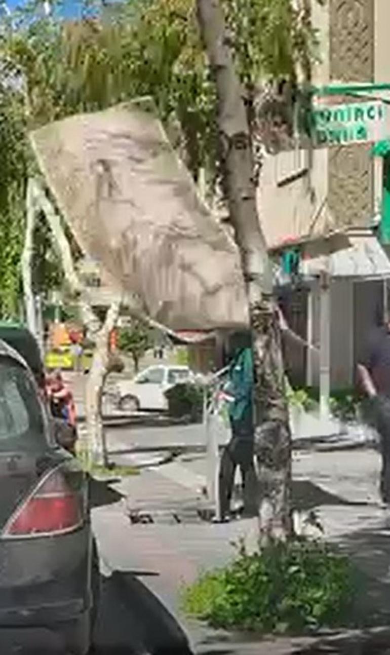 7nci kattan düşen halı, mağaza çalışanının başına isabet etti