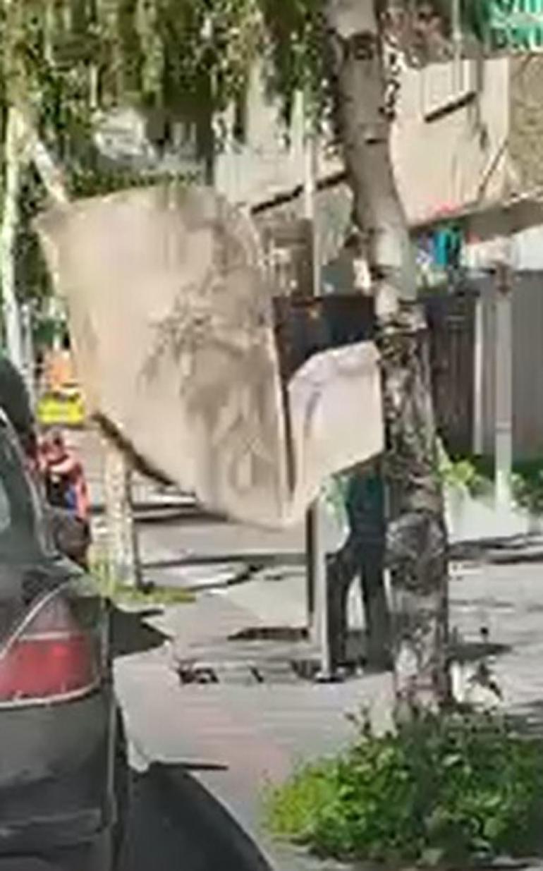 7nci kattan düşen halı, mağaza çalışanının başına isabet etti